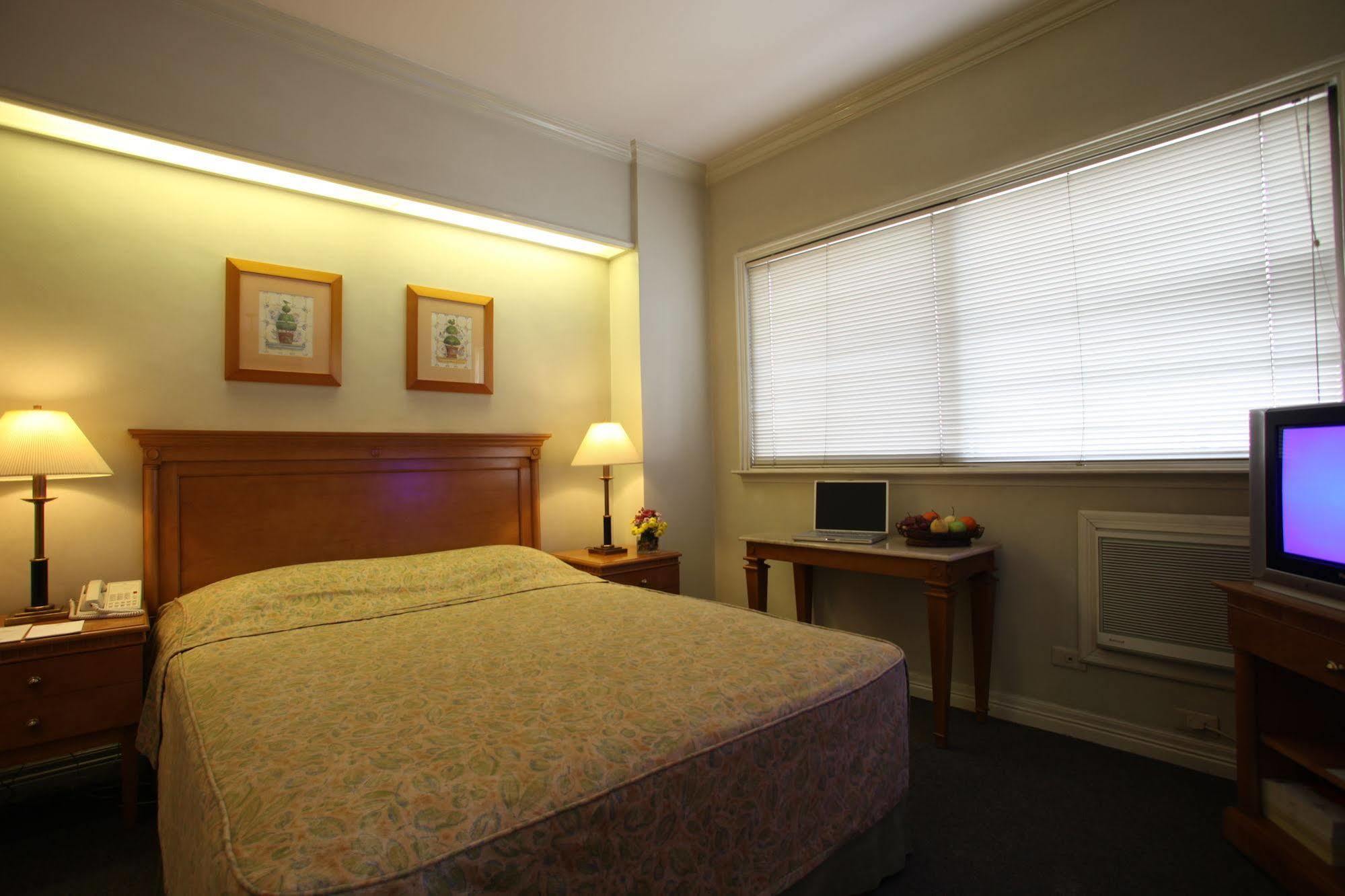 Sunny Bay Suites Manila Bagian luar foto