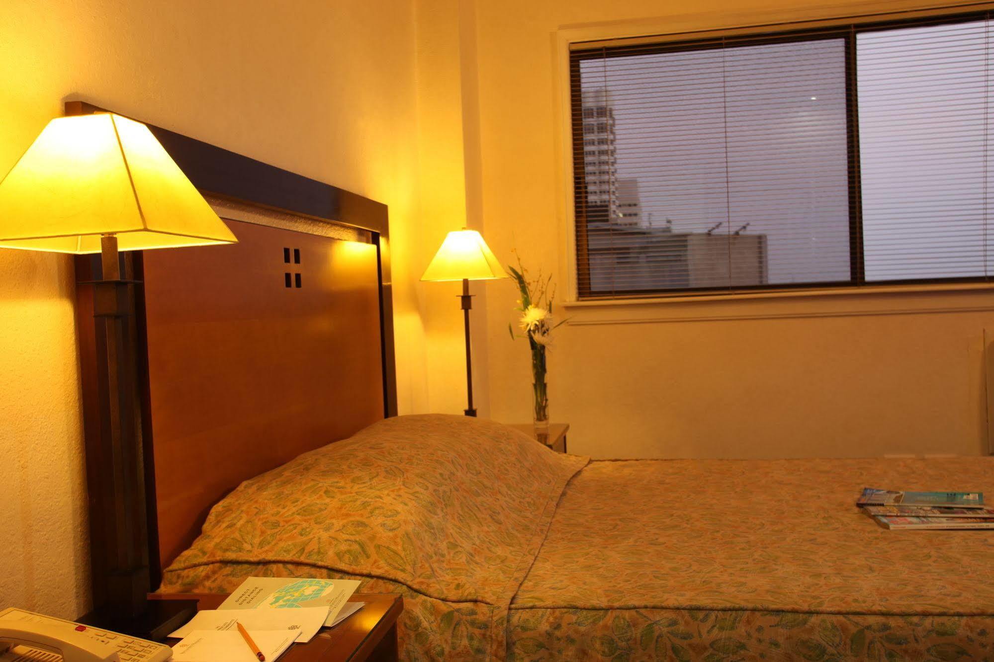 Sunny Bay Suites Manila Bagian luar foto